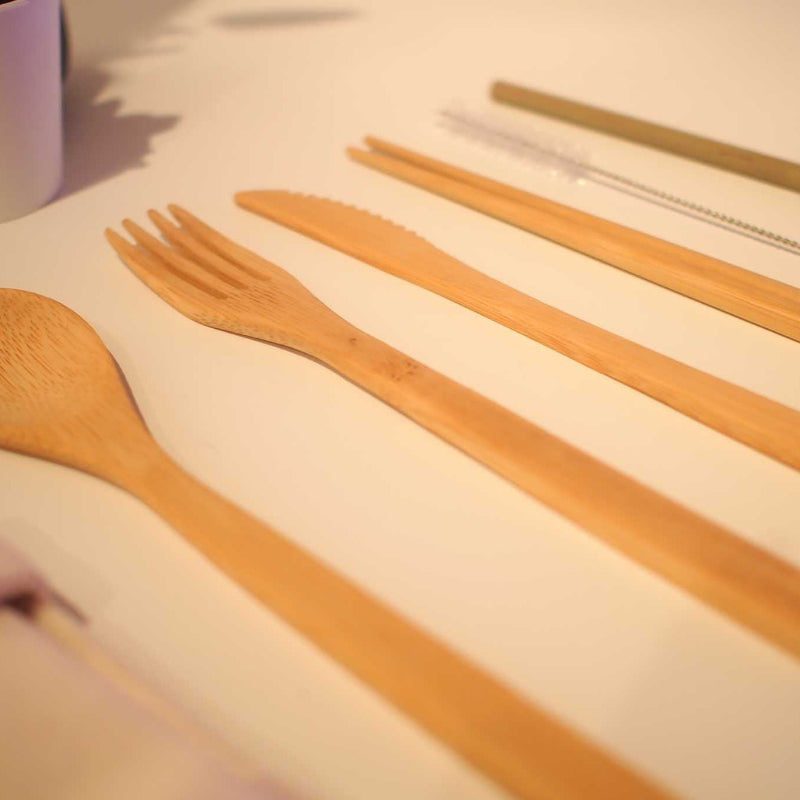 set of bamboo utensils laid out