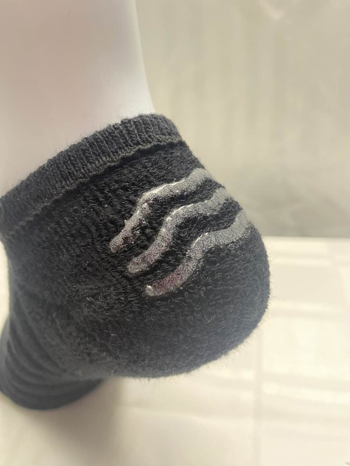 close up on heel grips bamboo cozy sock