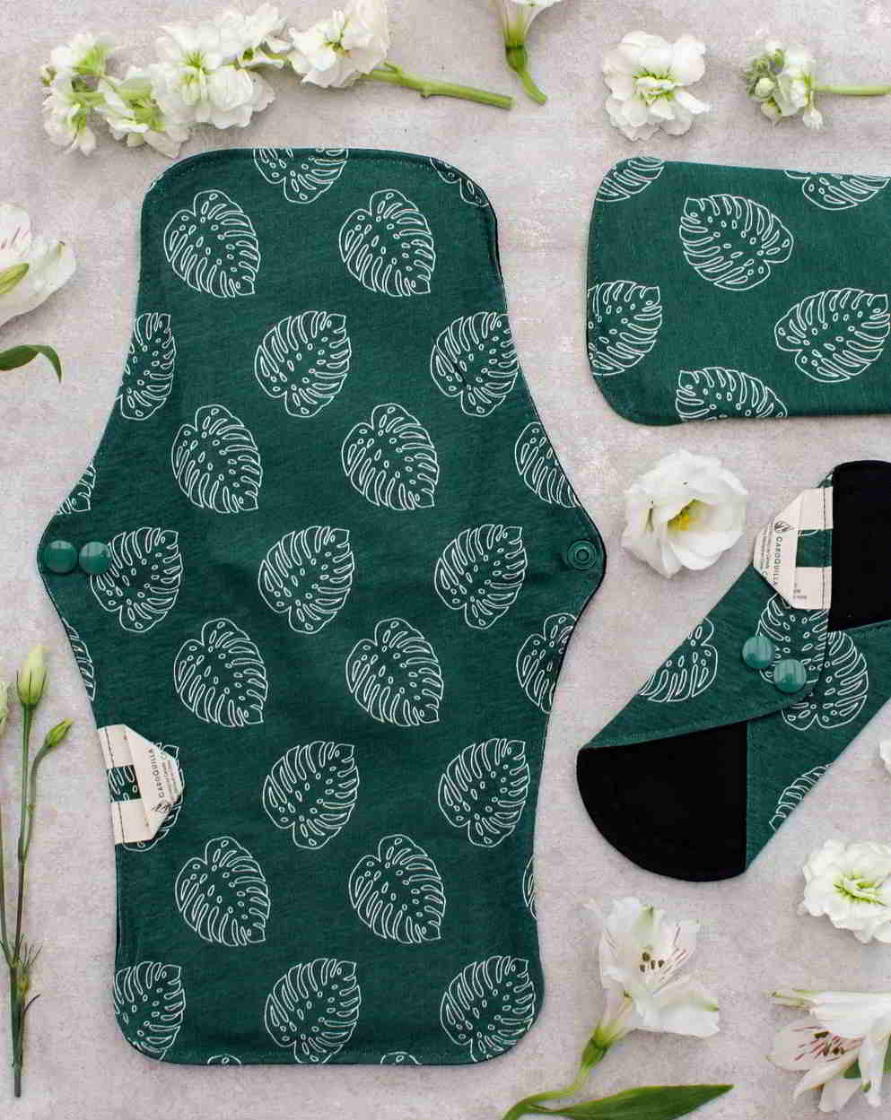 overnight menstrual reusable pads with the other sizes on the side