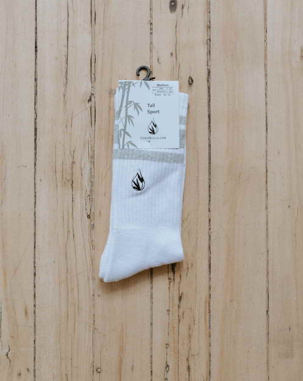 pair of tall sport bamboo socks in packaging