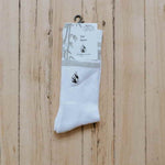 pair of tall sport bamboo socks in packaging