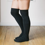black bamboo knee high socks being worn side view 