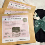 three bamboo reusable pads and one out of the package 