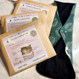 three bamboo reusable pads and one out of its packaging for size reference 