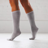A person wearing grey chunky boot bamboo socks 