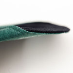close up of thickness of bamboo reusable pad 