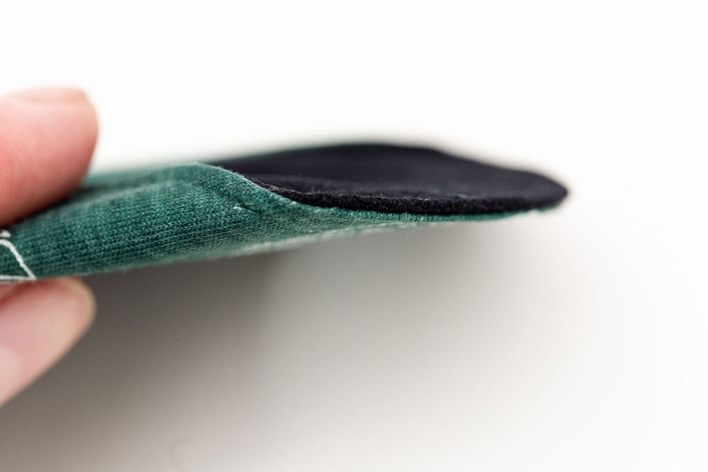 close up of thickness of bamboo reusable pad 