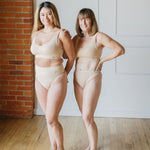 two women wearing bamboo wirefree padded bra in beige 