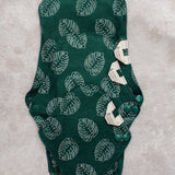 three bamboo reusable pads stacked on top of each other to show distinct sizes 