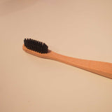 Bamboo toothbrush with black bristles 