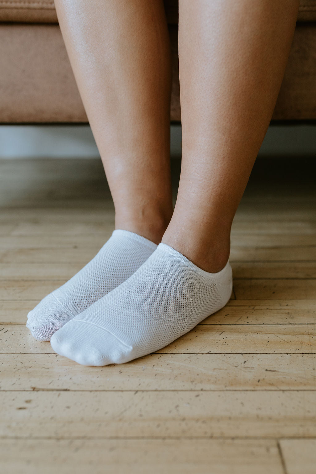 white bamboo no show sport socks being worn 