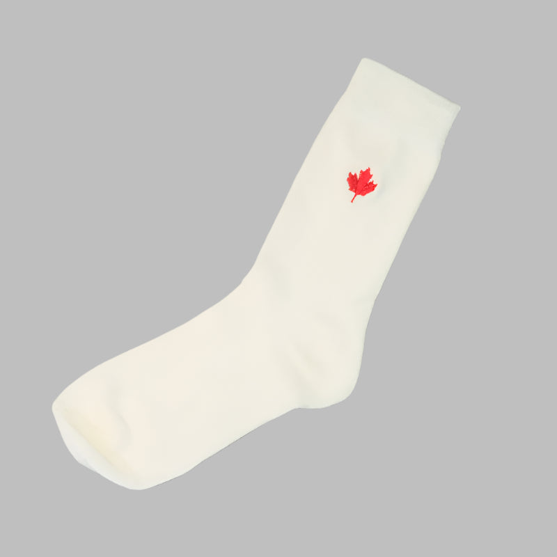 White bamboo sock with a red maple leaf design 